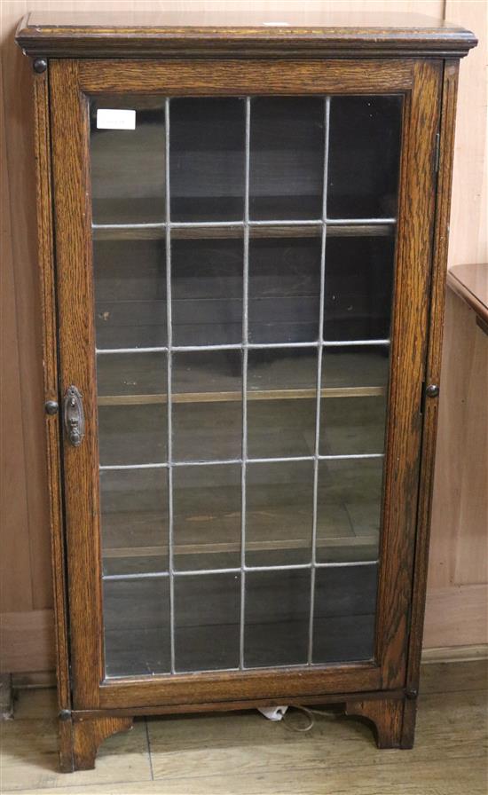 A 1920s oak lead glazed china cabinet W.61cm